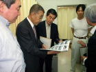 写真で被害状況を説明する後藤 康文氏
